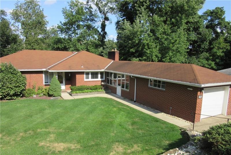 With lovely curb appeal and a pretty lot, this all