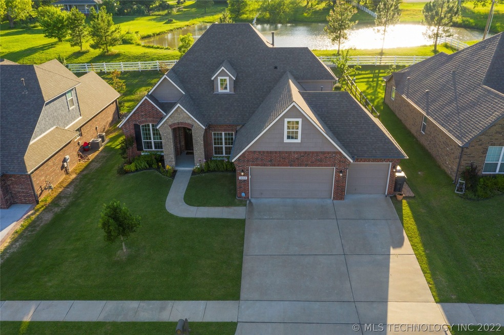 Property backs to private land with pond providing