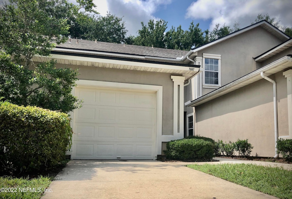 7887 Melvin Rd, Jacksonville, FL 32210 - photo 1