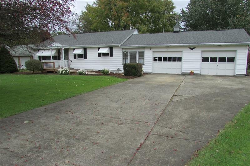 Exterior front of this well built ranch, breezeway