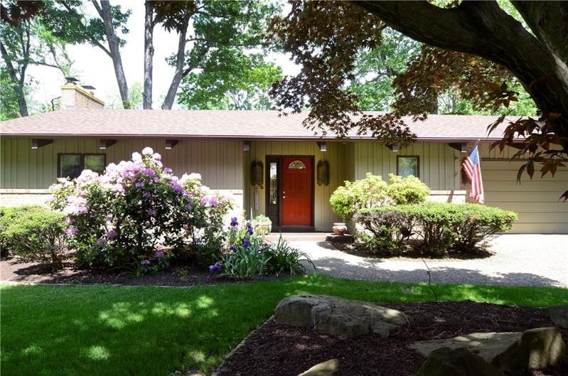 Exterior Front: Custom quality built home in the h