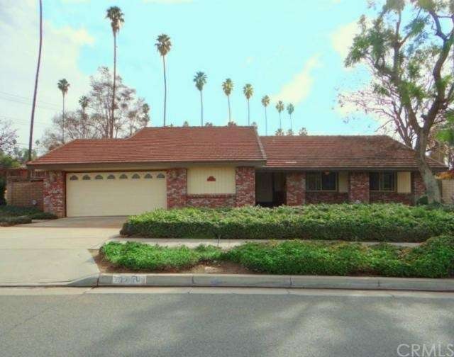 Beautiful curb appeal with brick facade, possible 