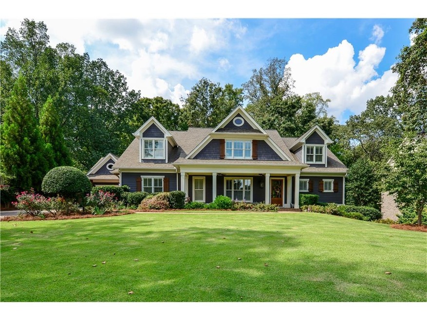 Hello curb appeal! With it's beautiful grounds, co
