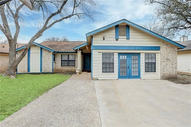 Front view of home.  French doors lead to converte