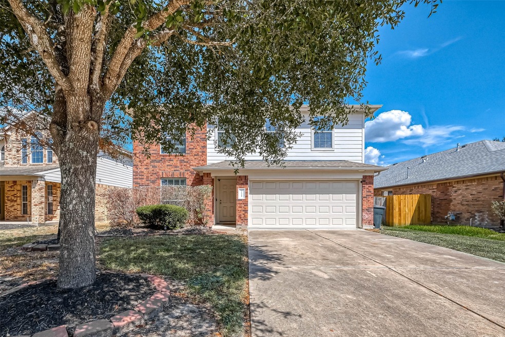 31722 Royal Woods Ct, Conroe, TX 77385 - photo 1