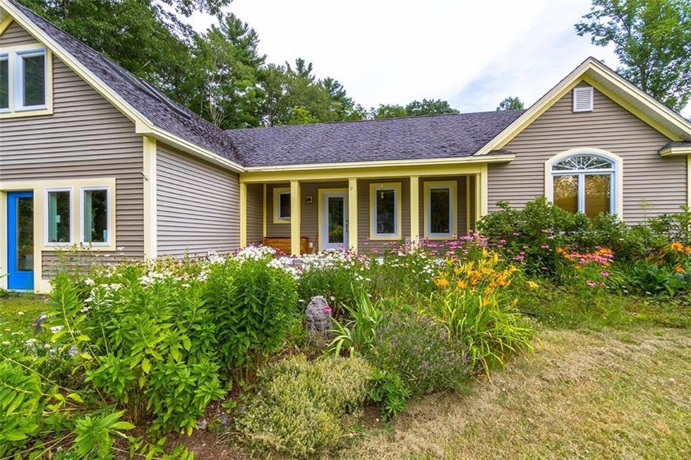 Front exterior and mature gardens