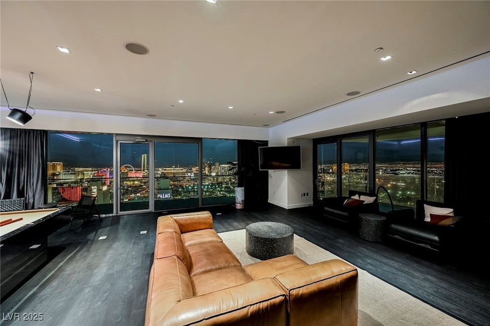 Living area with recessed lighting and full view o