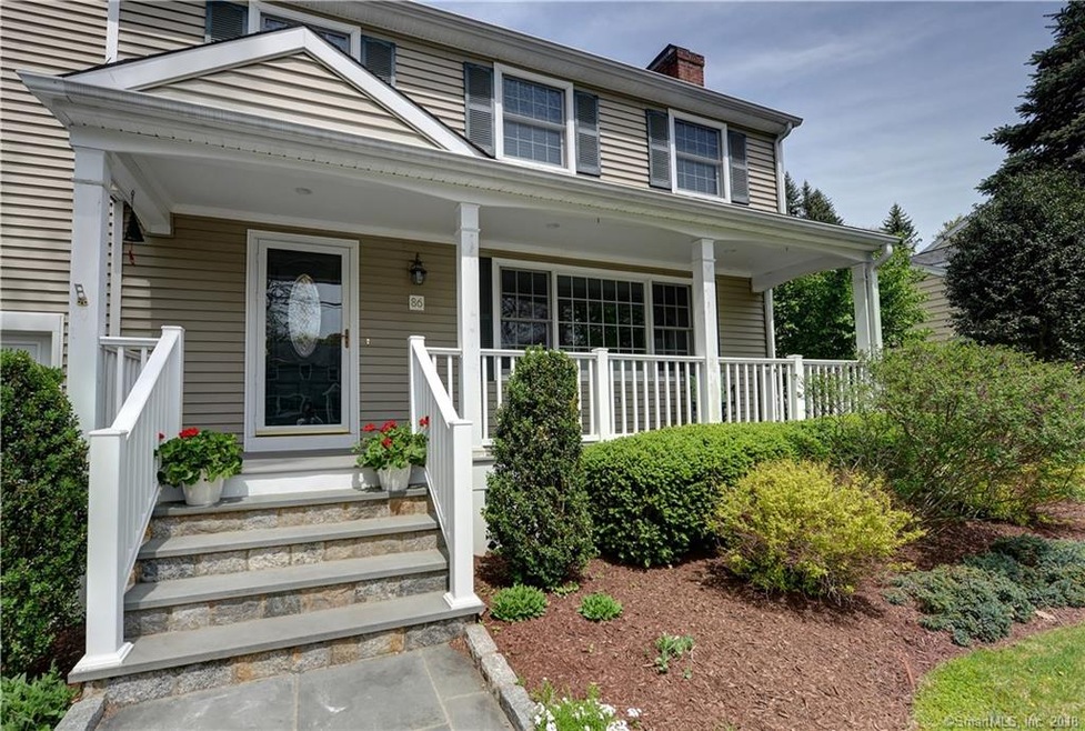 Welcoming entry/exit.   Professionally landscaped 