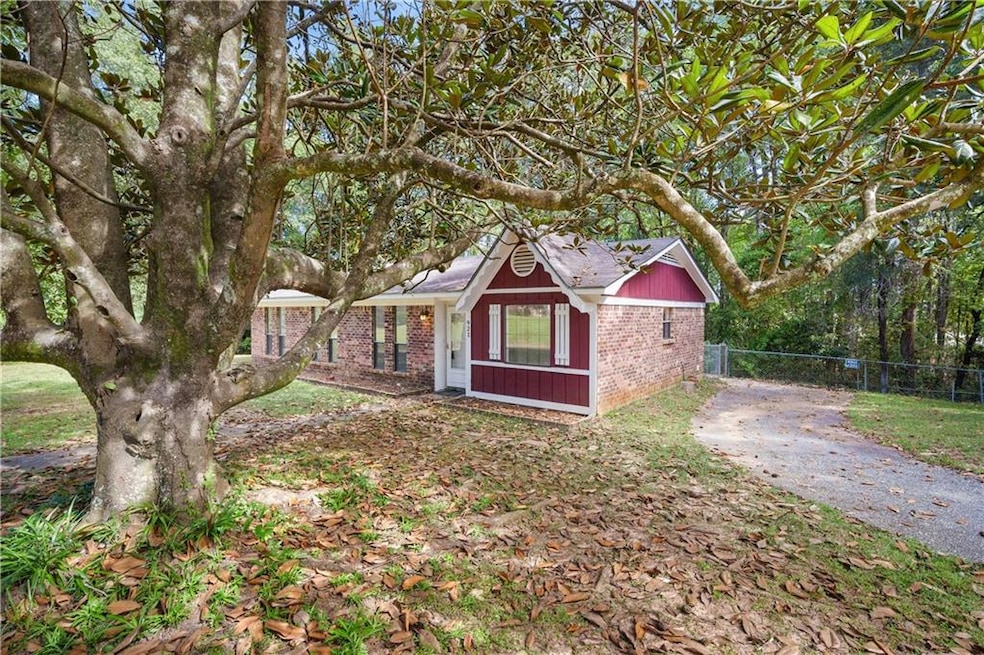 Bungalow with brick siding
