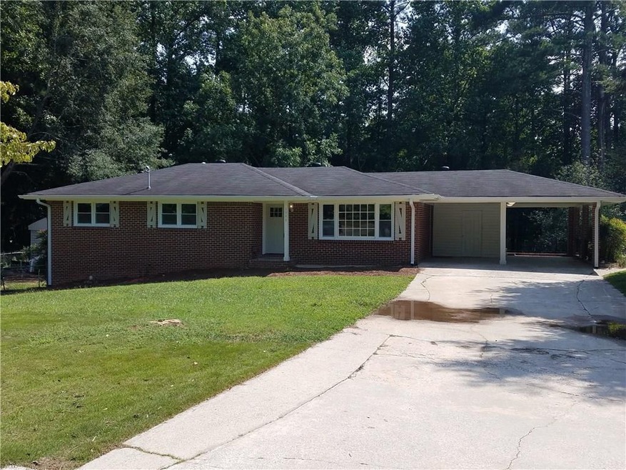 Welcome home to this four-sided brick beauty!