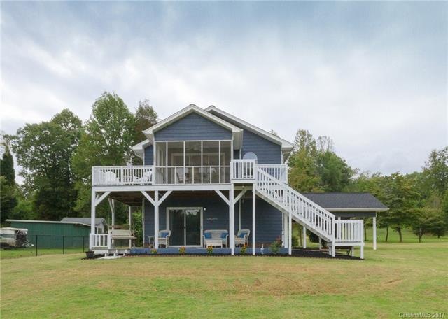 Rear View Overlooking the Level Backyard with Wide Cove Views!