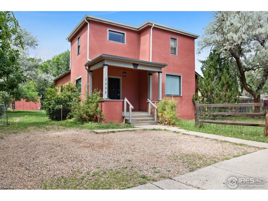 Front of home with large parking area