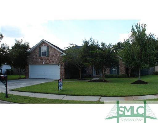 Exterior Front. Low maintenance brick and vinyl ex