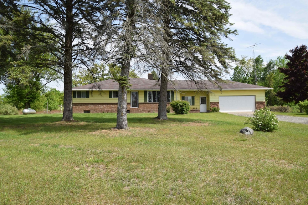 Situated on 26.18 acres of land this ranch home is ready and waiting for new owners to make it their own.  Peace and quiet with plenty of room to roam on your own property with the Kawkawlin river running along the rear of the property.