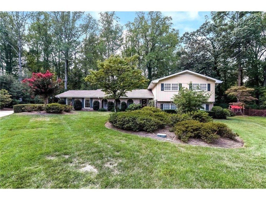 METICULOUSLY MAINTAINED FOUR BEDROOM HOME WITH BEA
