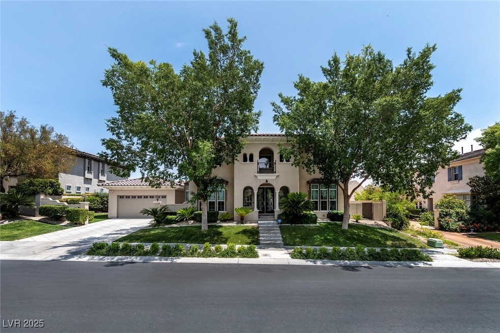 Mediterranean / spanish house with a garage, stucc