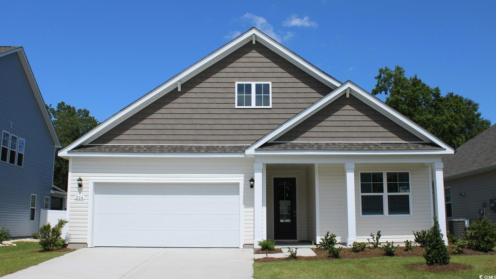 View of front of property with central AC unit and