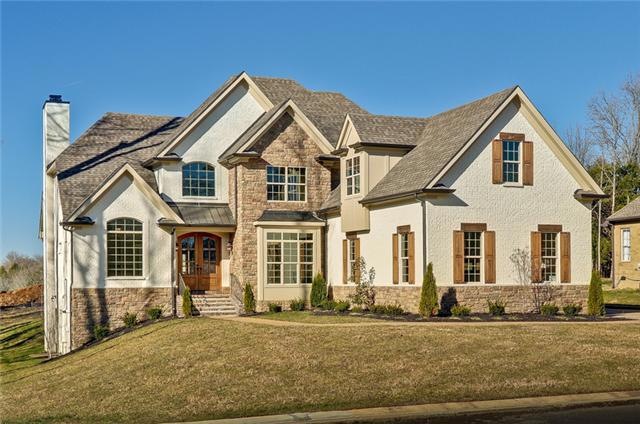 This house sits by a grove of trees which will always remain green space. Another row of trees is being planted in the backyard. There is a truly majestic feeling emanating from this home as you approach.