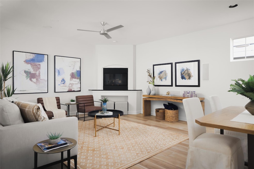 Living area with wood finished floors and ceiling