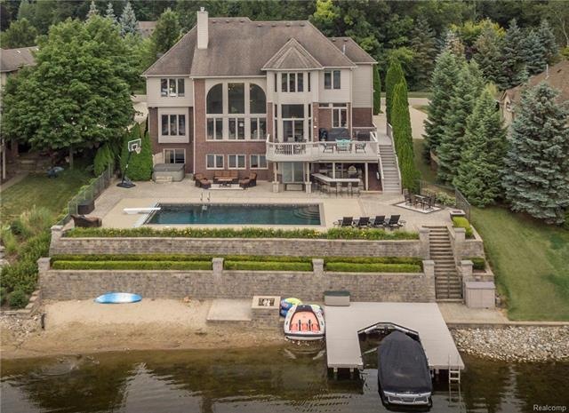 Gorgeous waterfront setting with In-ground pool an