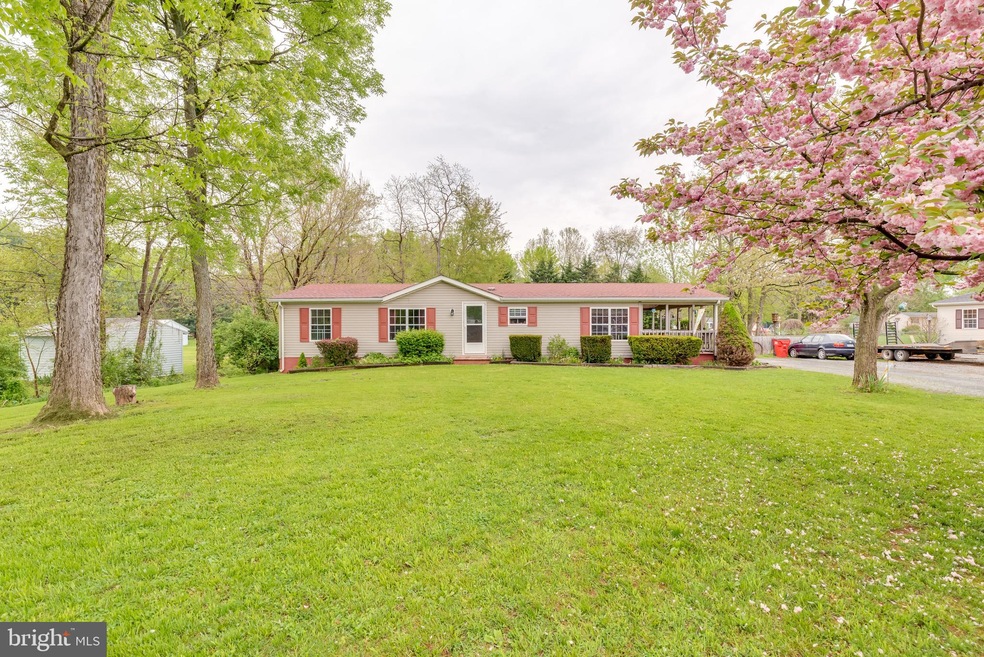 180 Warrior Dr, Bunker Hill, WV 25413 - photo 1