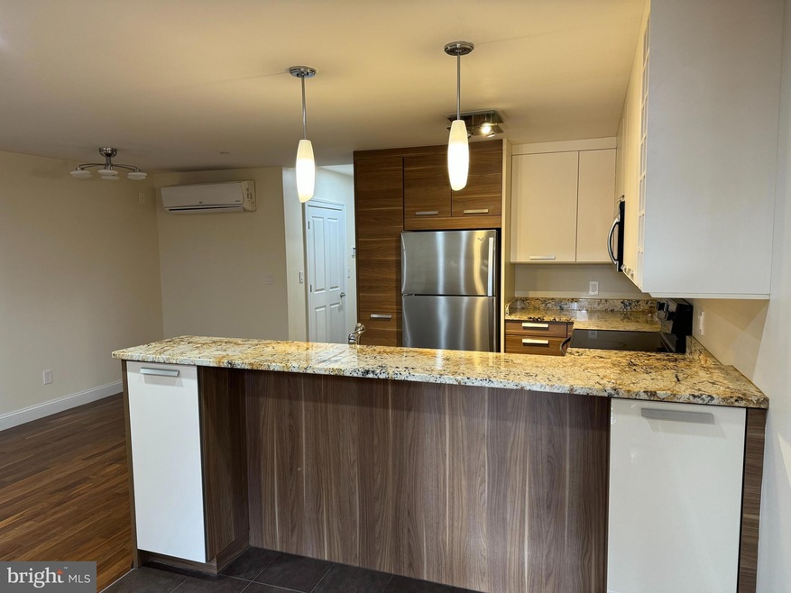 933 N Calvert St unit A, Baltimore, MD 21202 - photo 1