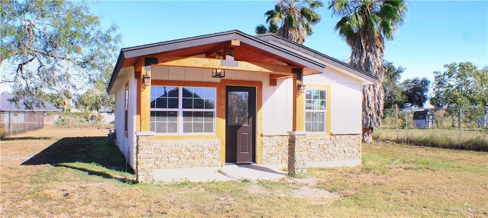 View of front facade with stone siding