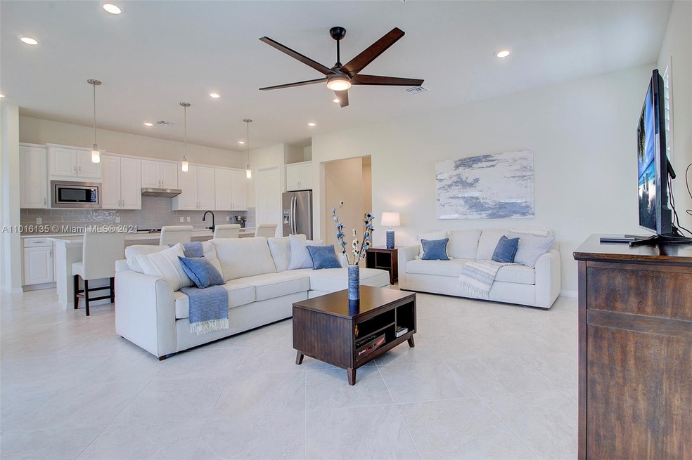 Living room, porcelain tile throughout living area