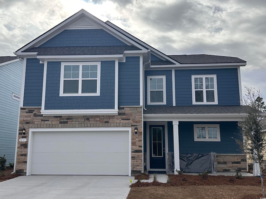 View of front of house with a garage