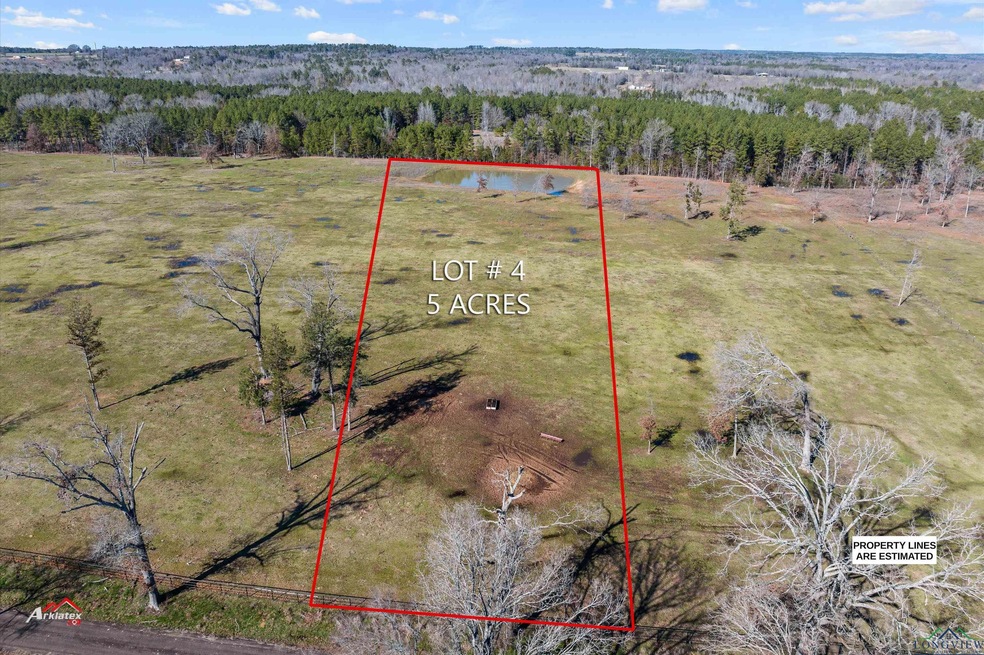 View of rural area with property boundaries highlighted and a forest