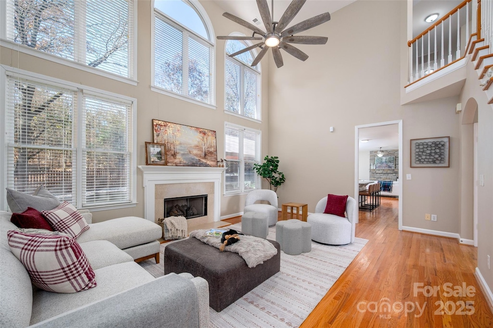 Inside, an inviting open floor plan features hardwoods throughout both levels. The stunning entry leads to a bright two-story great room with a new Verdian gas fireplace.