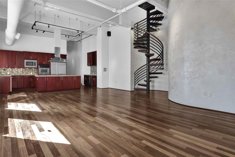 Huge open concept living, dining and kitchen area.