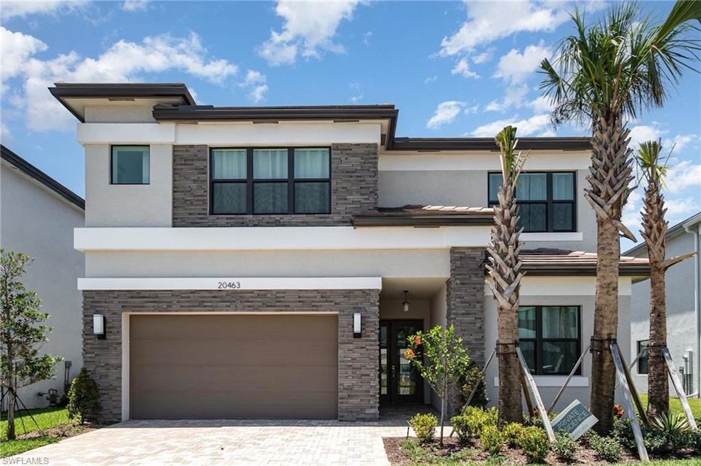 View of front of house with an attached garage, st
