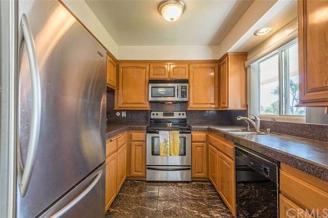 Updated kitchen with stainless appliances, marble 