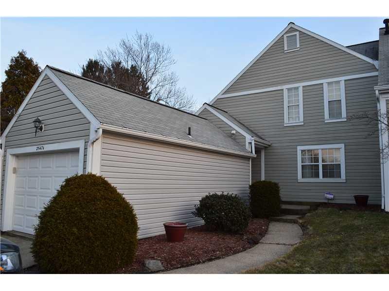 Exterior Front. single car garage, sidewalk past l