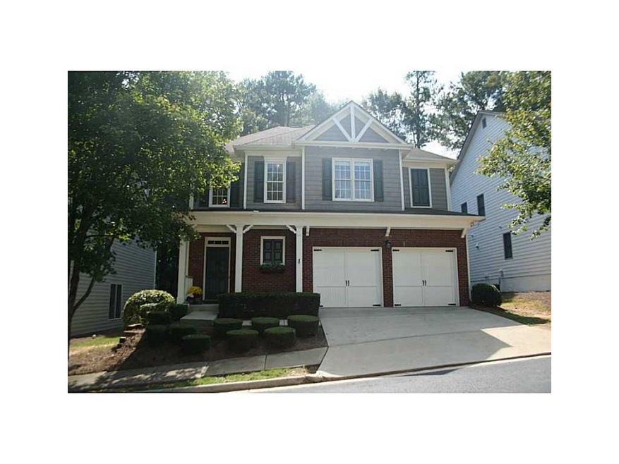Exterior Front. Brick and hardiplank exterior on c