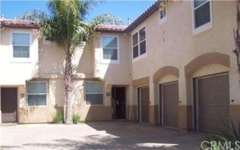 Exterior of 2 story unit showing attached garage a