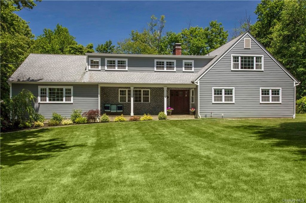 Fabulous 4 Bedroom cape colonial set on 1.44 acres