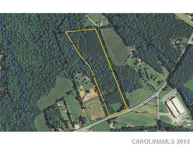 Aerial View - Aerial view of property showing small clearing in front, stream, and a mixture of hardwoods and loblolly pines.