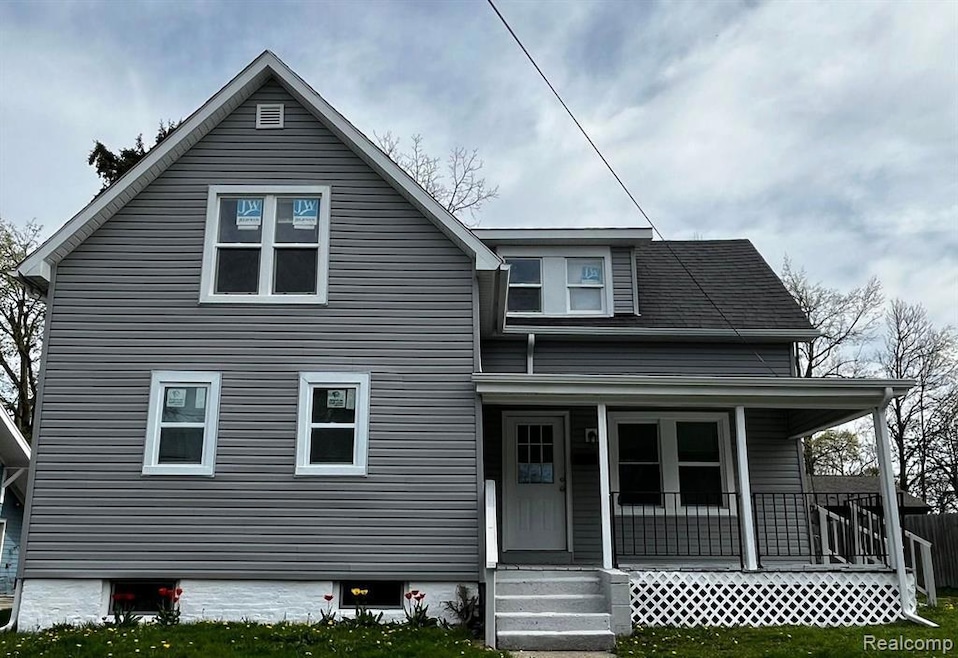 417 E Hunt St, Adrian, MI 49221 - photo 1