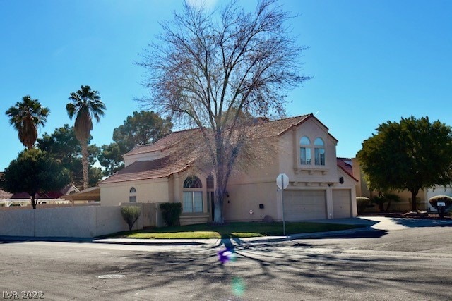 Extra Large Corner Lot.  North South facing home.