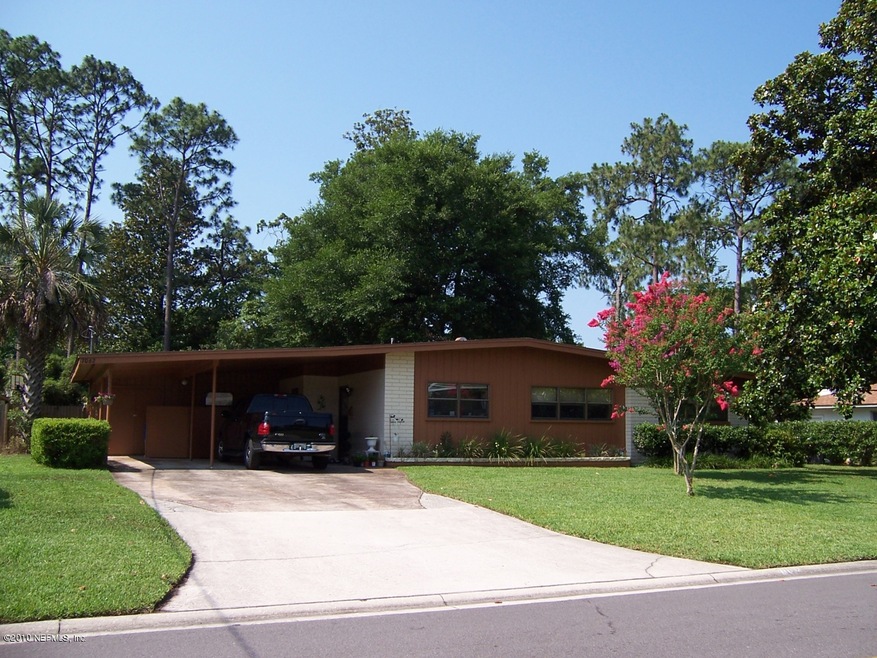 7062 Holiday Rd N, Jacksonville, FL 32216 - photo 1