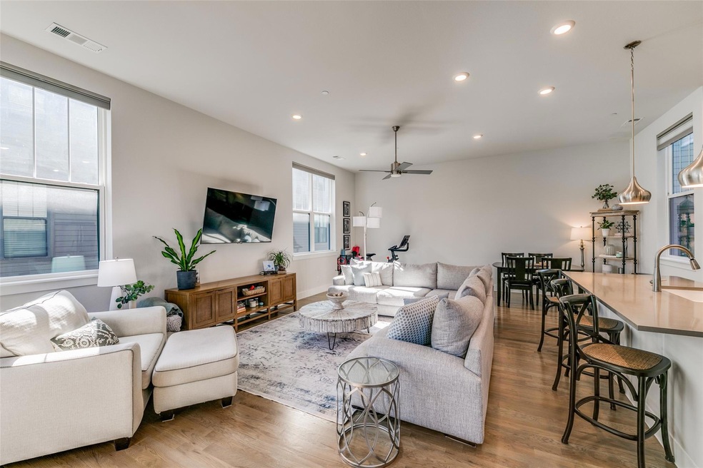Chef's kitchen opens up living+dining allowing a f
