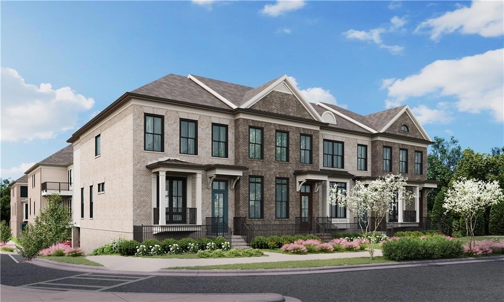 The Providence Group Byers Park Chamberlain Floor Plan.  This end unit boasts a covered front porch that overlooks green space and backs up to a wooded view.