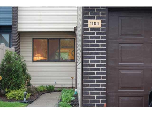 Exterior Front. Three bedroom Townhouse with an at