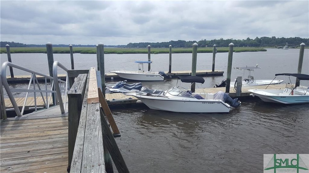 A PRIVATE BOAT SLIP IN COMMUNITY DOCK MARINA COMES