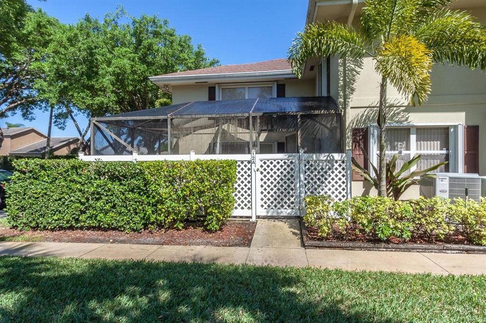 12 Amherst Ct unit A, Royal Palm Beach, FL 33411 - photo 1
