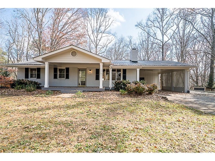 Gorgeous painted brick ranch in coveted Milton!