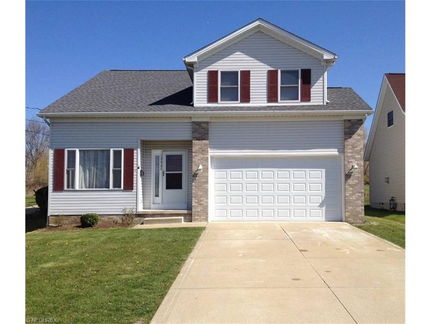 Sharp looking colonial with extra long double driv