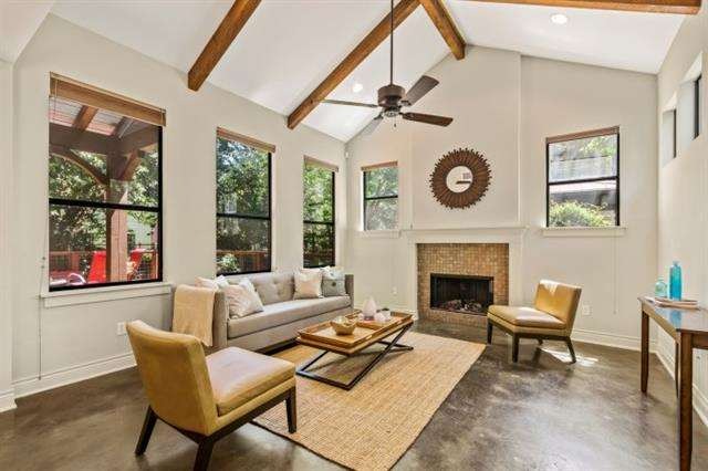 Wonderfully open living room is flooded with natur